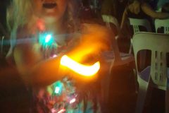 Jasmine Dancing with her candle and christmas light necklace still